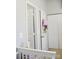 Bright bedroom featuring closet and an open doorway to the hallway at 12742 Spirit Bound Way, Charlotte, NC 28273