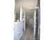 Well-lit foyer with wood-look floors, leading to the dining area and living spaces at 12742 Spirit Bound Way, Charlotte, NC 28273