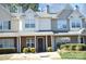 Attractive townhouse with a blend of siding, brick accents, and well-kept front yard at 12742 Spirit Bound Way, Charlotte, NC 28273