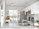 Bright kitchen featuring granite countertops, stainless steel appliances, and ample natural light at 12742 Spirit Bound Way, Charlotte, NC 28273