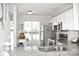 Kitchen view highlighting stainless steel appliances, granite countertops, and a sunlit atmosphere at 12742 Spirit Bound Way, Charlotte, NC 28273
