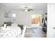 Bright living room offers hardwood floors, sliding glass doors, and ceiling fan at 12742 Spirit Bound Way, Charlotte, NC 28273