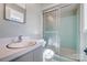 Bathroom featuring a vanity sink and a shower with sliding glass doors at 1301 Old Farm Rd, Charlotte, NC 28226