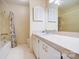 Bathroom featuring a shower-tub combination and a vanity sink with a large mirror at 1301 Old Farm Rd, Charlotte, NC 28226