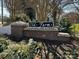 Charming Old Farm neighborhood entrance with landscaped surroundings and a welcoming ambiance at 1301 Old Farm Rd, Charlotte, NC 28226