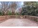 Large back deck offering space for outdoor seating and entertaining at 1416 Woodland Dr, Charlotte, NC 28205