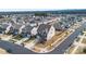 Expansive aerial view showcasing the neighborhood, landscaping, and proximity to nearby attractions at 14815 Superior St, Charlotte, NC 28273
