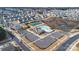 Beautiful aerial view of the community amenities, including the pool, clubhouse, tennis courts, and ample parking at 14815 Superior St, Charlotte, NC 28273