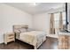 Bedroom featuring wood-look floors, natural light, and modern design at 14815 Superior St, Charlotte, NC 28273