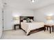 Cozy bedroom featuring bedside tables with lamps and plush carpeting for ultimate comfort at 14815 Superior St, Charlotte, NC 28273