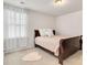Comfortable bedroom with a cozy rug, perfect for relaxing after a long day at 14815 Superior St, Charlotte, NC 28273
