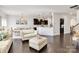 Bright living space with hardwood floors, kitchen view, and stylish furniture at 14815 Superior St, Charlotte, NC 28273