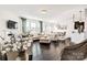 Open-concept living room featuring hardwood floors, dining area, and bright light at 14815 Superior St, Charlotte, NC 28273