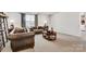 Inviting living room featuring comfortable couches and neutral carpeting at 14815 Superior St, Charlotte, NC 28273