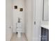 Powder room featuring a classic toilet, neutral decor, and clean lines at 14815 Superior St, Charlotte, NC 28273