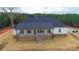 Overhead view of a single-story home featuring a spacious back porch and steps leading into the yard at 150 Belk Estate Dr, Mooresville, NC 28115