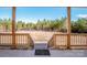 Inviting backyard view framed by wooden porch columns and lush greenery at 150 Belk Estate Dr, Mooresville, NC 28115