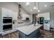 Modern kitchen with stainless steel appliances, a center island, and white cabinetry at 150 Belk Estate Dr, Mooresville, NC 28115