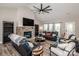 Comfortable living room with stone fireplace, stylish furniture, and ample light at 150 Belk Estate Dr, Mooresville, NC 28115