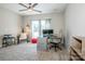 Home office space featuring a modern desk, comfortable chair, and ample natural light, creating an ideal workspace at 150 Belk Estate Dr, Mooresville, NC 28115