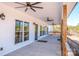 Spacious porch with multiple windows and ceiling fans, perfect for outdoor living at 150 Belk Estate Dr, Mooresville, NC 28115