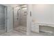 Modern bathroom features a glass-enclosed shower, vanity area, and lots of natural light at 15035 Batteliere Dr, Charlotte, NC 28278