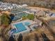 Aerial view of the community pool and recreational facilities, highlighting the neighborhood amenities at 15035 Batteliere Dr, Charlotte, NC 28278