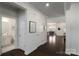 Hallway view showcasing the home's modern interiors, hardwood floors, and open layout at 15035 Batteliere Dr, Charlotte, NC 28278