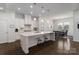 Bright kitchen with island, stainless appliances, and an open layout at 15035 Batteliere Dr, Charlotte, NC 28278