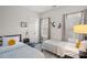 Bright bedroom with two beds, a window with shutters, and playful decor at 16504 Knox Run Rd, Huntersville, NC 28078