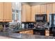 Modern kitchen with stainless steel appliances and natural light at 16504 Knox Run Rd, Huntersville, NC 28078