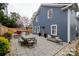 Backyard with patio, featuring an outdoor kitchen, dining area, and outdoor furniture at 1703 Luther St, Charlotte, NC 28204