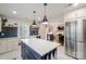 Spacious kitchen with an island, stainless steel appliances, and an open view to the living area at 1703 Luther St, Charlotte, NC 28204