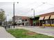 Street view of commercial building and businesses at 1703 Luther St, Charlotte, NC 28204