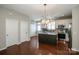 Bright kitchen features a center island, stainless appliances, and sleek finishes at 19915 Lamp Lighters Way, Cornelius, NC 28031