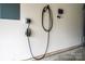 Garage outfitted with an EV charger, perfect for the modern car owner who needs to plug in at home at 2131 Belterra Dr, Charlotte, NC 28216