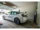 Spacious garage featuring an electric vehicle charging station for convenient at-home charging at 2131 Belterra Dr, Charlotte, NC 28216