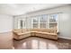 Spacious living room featuring hardwood floors, and lots of natural light at 2131 Belterra Dr, Charlotte, NC 28216