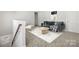 Cozy loft area with comfortable seating, a decorative painting, and carpeted flooring for ultimate relaxation at 2131 Belterra Dr, Charlotte, NC 28216