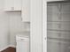 A pantry space has built in wire shelves, white cabinets, white countertop and stainless steel hardware at 2131 Belterra Dr, Charlotte, NC 28216