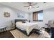 Comfortable bedroom with neutral tones, ceiling fan, and ample natural light at 222 S Caldwell St # 2008, Charlotte, NC 28202
