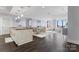 Open-concept living and dining space, featuring modern finishes and hardwood floors at 222 S Caldwell St # 2008, Charlotte, NC 28202