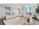 Bright living room with large windows and comfortable seating area at 222 S Caldwell St # 2008, Charlotte, NC 28202