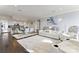 Open layout showcasing a modern kitchen, dining area, and spacious living room at 222 S Caldwell St # 2008, Charlotte, NC 28202