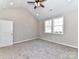 Vaulted ceiling bedroom with modern ceiling fan and natural light from double hung windows at 2328 Kingsburry Rd, York, SC 29745