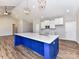 Eat-in kitchen featuring a large island with seating, custom cabinets, and pendant lighting at 2328 Kingsburry Rd, York, SC 29745