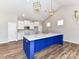 Well-appointed kitchen featuring custom cabinets, modern appliances, and large island with a sink at 2328 Kingsburry Rd, York, SC 29745