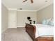 Cozy main bedroom with a large window and neutral carpet and a workout machine at 261 Crownsgate Ct, Charlotte, NC 28207
