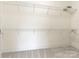Walk-in closet featuring neutral carpet and wire shelving at 261 Crownsgate Ct, Charlotte, NC 28207