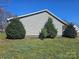 The exterior features fresh gray siding and green trees at 2630 Sloan Dr, Charlotte, NC 28208